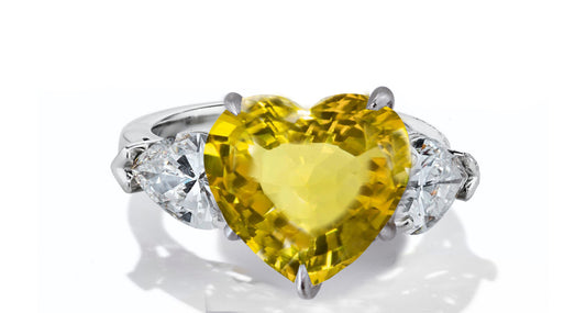 631 custom made unique heart yellow sapphire center stone and heart diamond accent three stone engagement ring