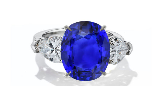 632 custom made unique oval blue sapphire center stone and pears diamond accent three stone engagement ring