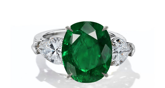 632 custom made unique oval emerald center stone and pears diamond accent three stone engagement ring
