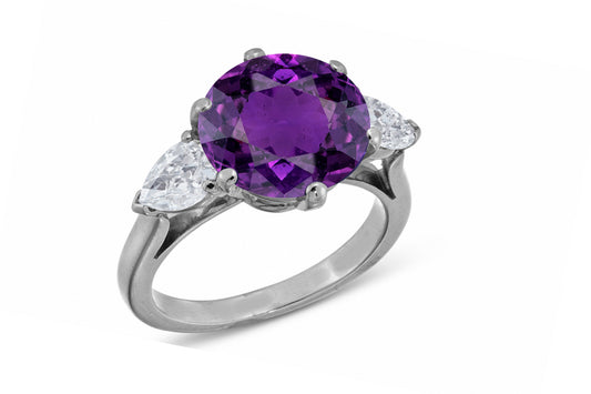 638 custom made unique round purple sapphire center stone and pears diamond accent three stone engagement ring