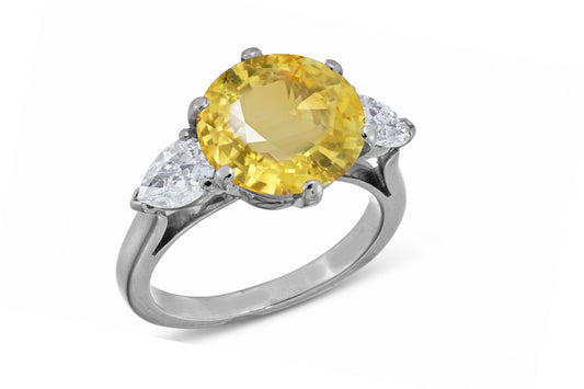 638 custom made unique round yellow sapphire center stone and pears diamond accent three stone engagement ring