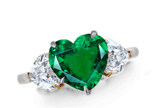 640 custom made unique heart emerald center stone and heart diamond accent three stone engagement ring