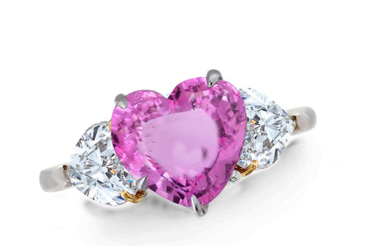 640 custom made unique heart pink sapphire center stone and heart diamond accent three stone engagement ring