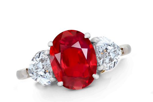 644 custom made unique oval ruby center stone and heart diamond accent three stone engagement ring