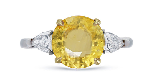 645 custom made unique round yellow sapphire center stone and pears diamond accent three stone engagement ring
