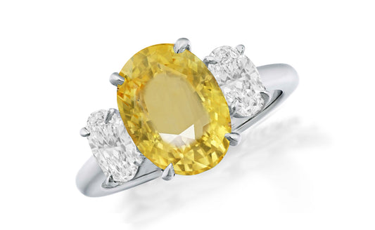 648 custom made unique oval yellow sapphire center stone and oval diamond accent three stone engagement ring