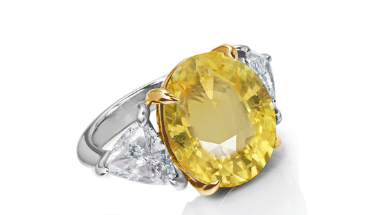 649 custom made unique oval yellow sapphire center stone and trillion diamond accent three stone engagement ring