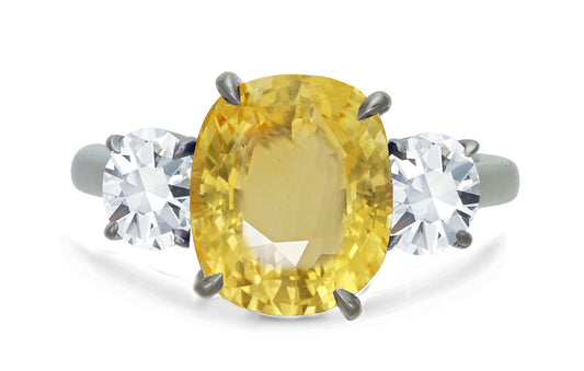 650 custom made unique oval yellow sapphire center stone and round diamond accent three stone engagement ring