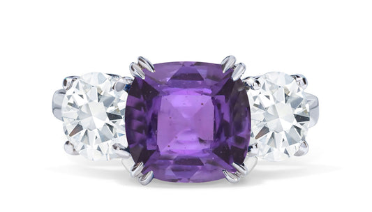 651 custom made unique cushion purple sapphire center stone and round diamond accent three stone engagement ring