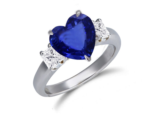 652 custom made unique heart blue sapphire center stone and squae diamond accent three stone engagement ring