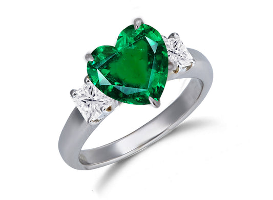 652 custom made unique heart emerald center stone and squae diamond accent three stone engagement ring