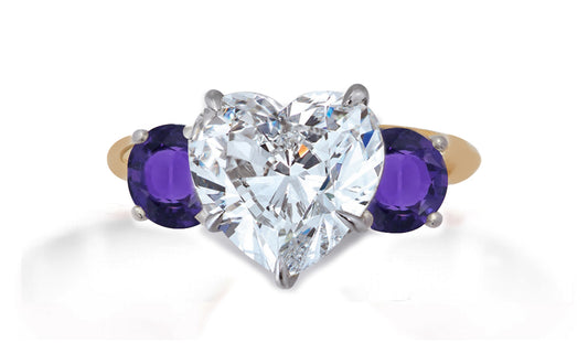 653 custom made unique heart diamond center stone and round purple sapphire accent three stone engagement ring