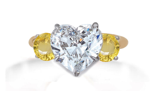 653 custom made unique heart diamond center stone and round yellow sapphire accent three stone engagement ring