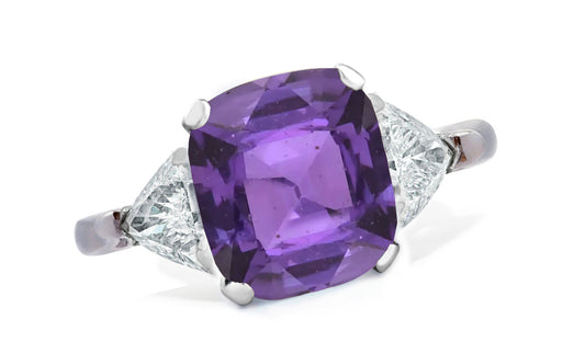 654 custom made unique cushion purple sapphire center stone and trillion diamond accent three stone engagement ring