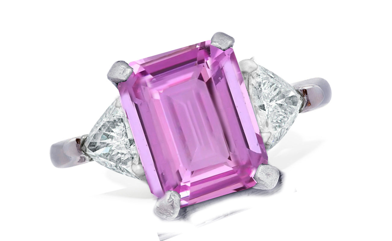655 custom made unique emerald cut pink sapphire center stone and trillion diamond accent three stone engagement ring