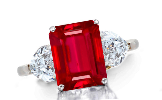 657 custom made unique emerald cut ruby center stone and heart diamond accent three stone engagement ring