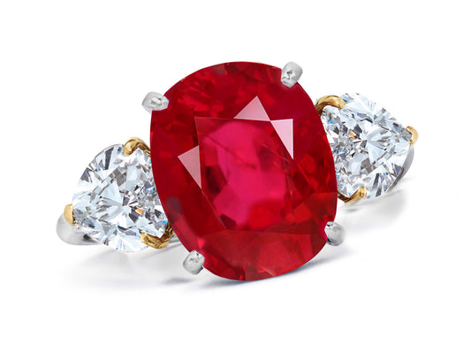 660 custom made unique oval ruby center stone and heart diamond accent three stone engagement ring