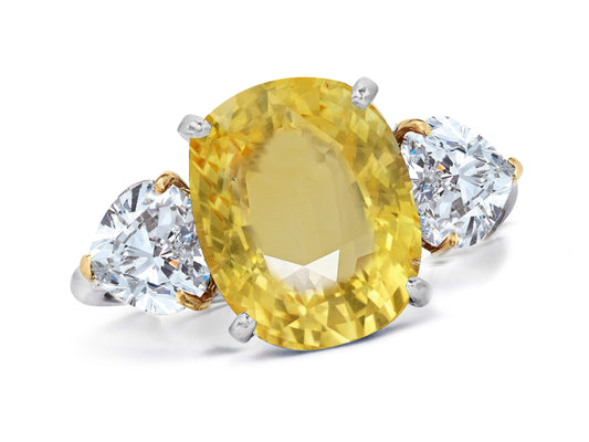 660 custom made unique oval yellow sapphire center stone and heart diamond accent three stone engagement ring