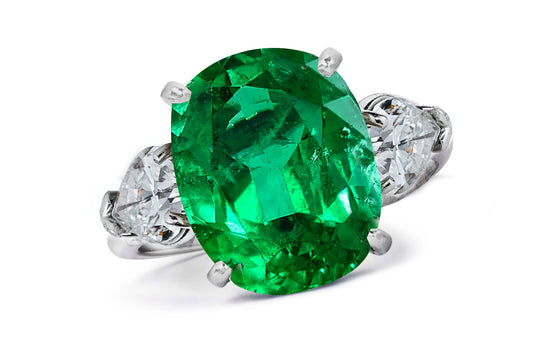 661 custom made unique oval emerald center stone and pears diamond accent three stone engagement ring