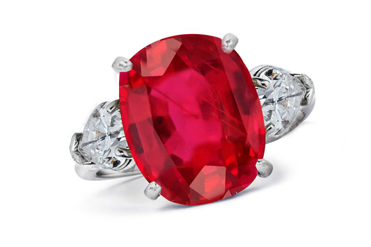 661 custom made unique oval ruby center stone and pears diamond accent three stone engagement ring