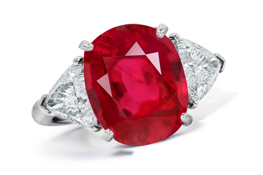 662 custom made unique oval ruby center stone and trillion diamond accent three stone engagement ring