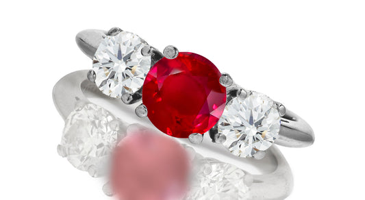 667 custom made unique round ruby center stone and round diamond accent three stone engagement ring
