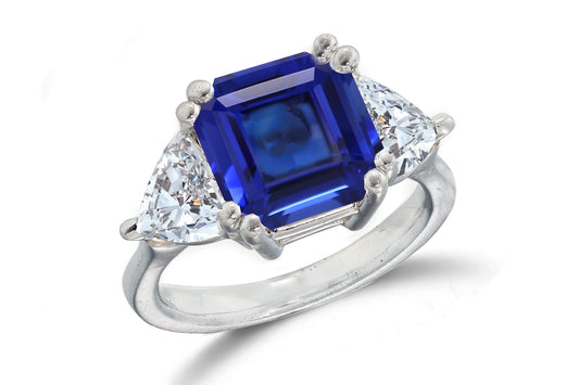 668 custom made unique asscher blue sapphire center stone and heart diamond accent three stone engagement ring