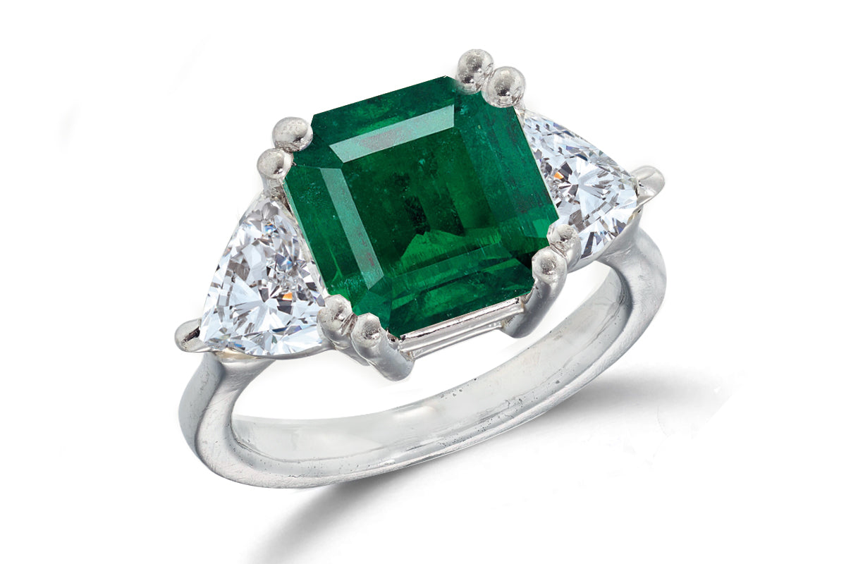 668 custom made unique asscher emerald center stone and heart diamond accent three stone engagement ring
