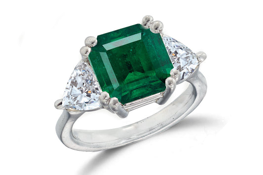 668 custom made unique asscher emerald center stone and heart diamond accent three stone engagement ring