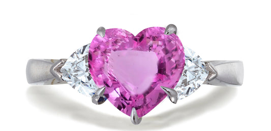 678 custom made unique heart pink sapphire center stone and heart diamond accent three stone engagement ring