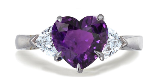 678 custom made unique heart purple sapphire center stone and heart diamond accent three stone engagement ring