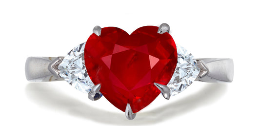 678 custom made unique heart ruby center stone and heart diamond accent three stone engagement ring