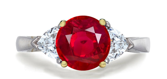 680 custom made unique round ruby center stone and heart diamond accent three stone engagement ring