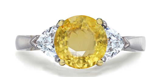 680 custom made unique round yellow sapphire center stone and heart diamond accent three stone engagement ring