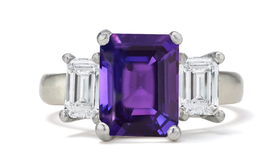 682 custom made unique emerald cut purple sapphire center stone and emerald cut diamond accent three stone engagement ring