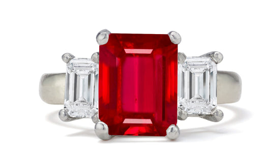 682 custom made unique emerald cut ruby center stone and emerald cut diamond accent three stone engagement ring