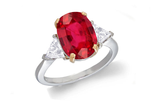 685 custom made unique oval ruby center stone and trillion diamond accent three stone engagement ring