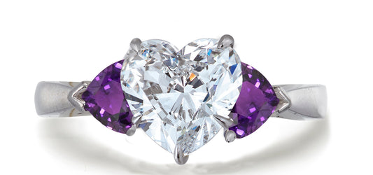 686 custom made unique heart diamond center stone and heart purple sapphire accent three stone engagement ring