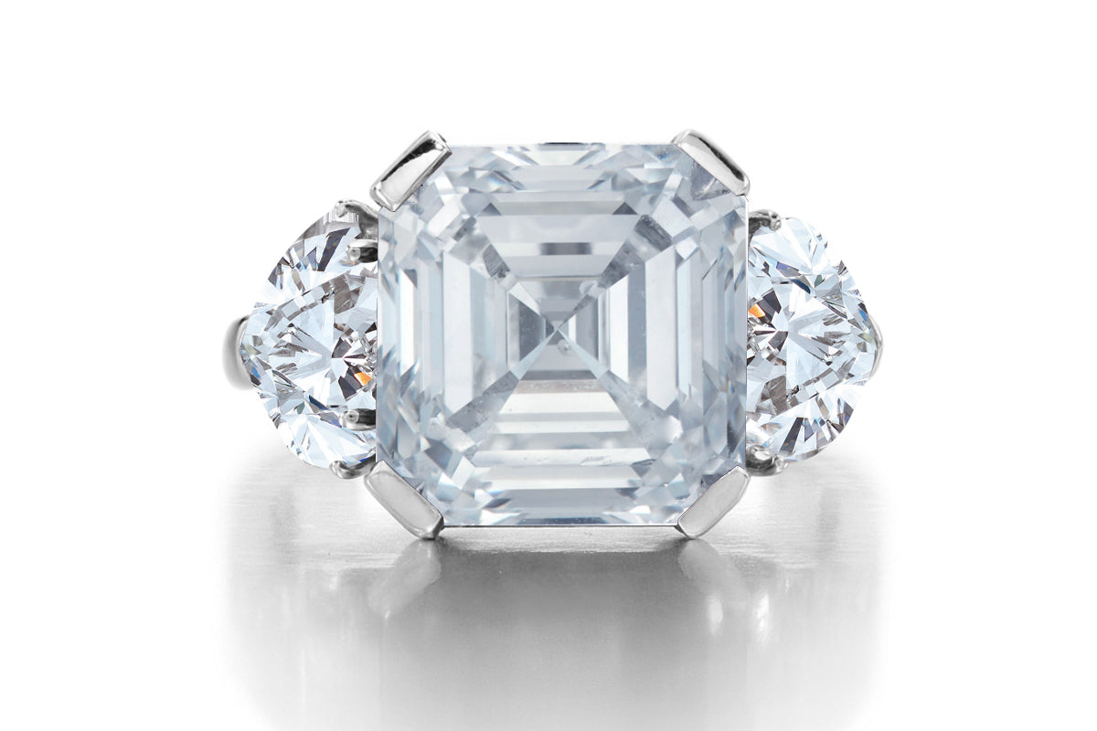 689 custom made unique asscher cut diamond center stone and heart diamond accent three stone engagement ring