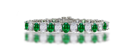 7 custom unique alternating oval emerald and diamond tennis bracelet