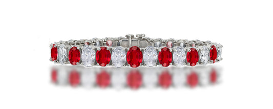 7 custom unique alternating oval ruby and diamond tennis bracelet