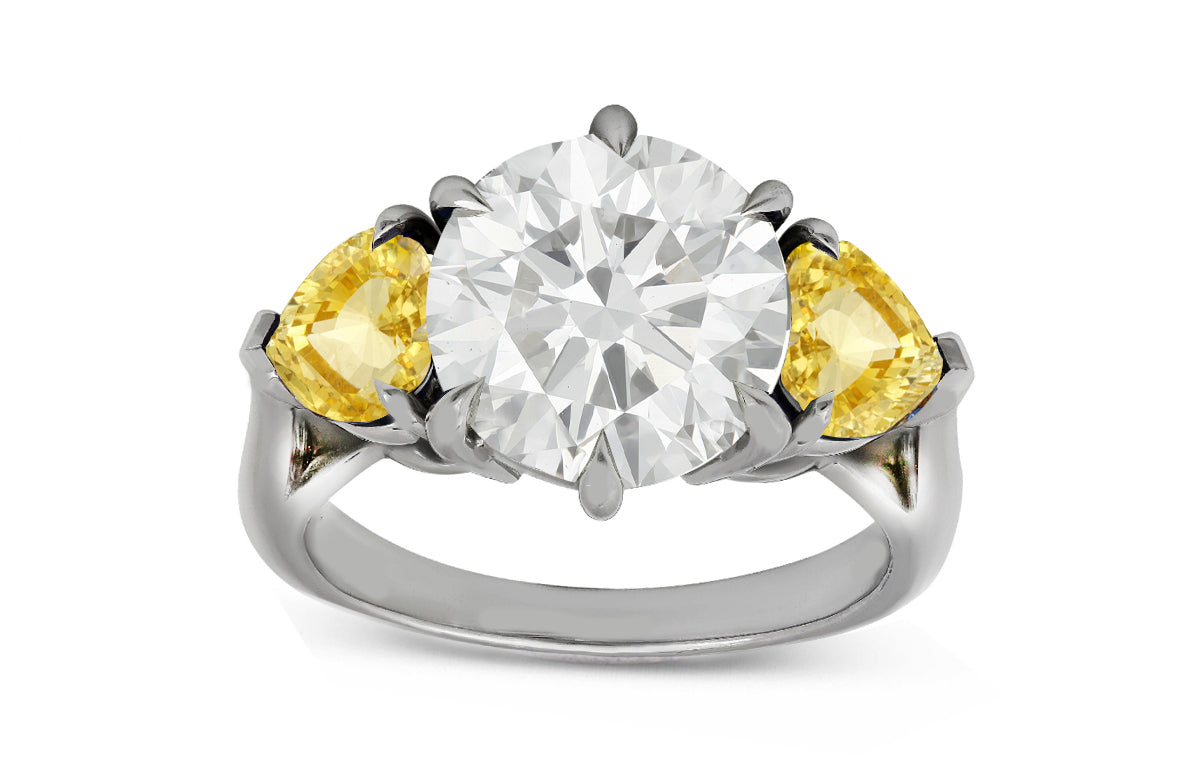 78 custom made unique round diamond and heart yellow sapphire side three stone engagement ring