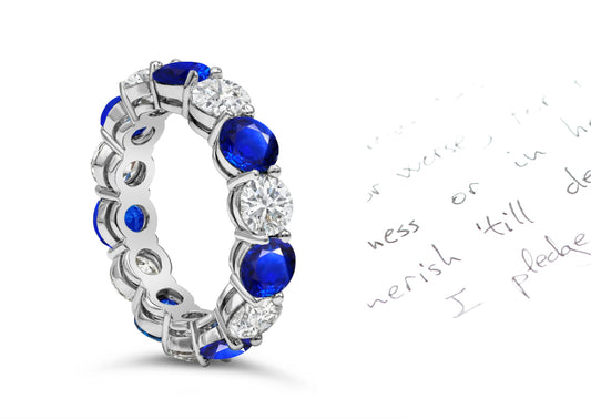 88 custom made unique stackable alternating round blue sapphire and diamond prong set eternity ring
