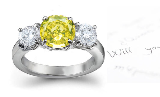 engagement ring three stone with fancy round yellow diamond center and side white round diamonds