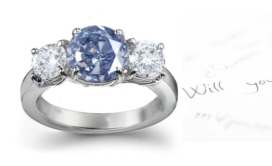 engagement ring three stone with fancy round blue diamond and side white round diamonds