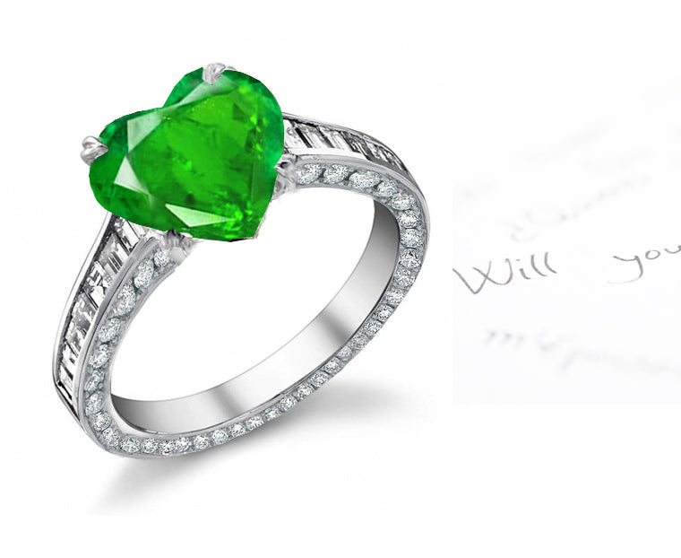 engagement ring with heart emerald center and diamond accents band