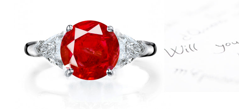 engagement ring three stone with round ruby and side trillion diamonds