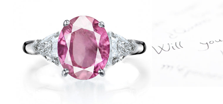 engagement ring three stone with oval pink sapphire and side trillion diamonds