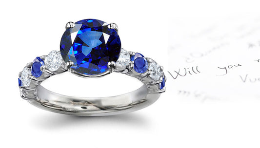engagement ring with round blue sapphires and diamonds