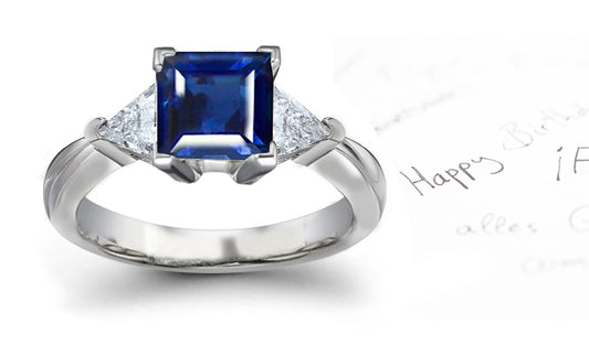 engagement ring three stone with square blue sapphire and side trillion diamonds